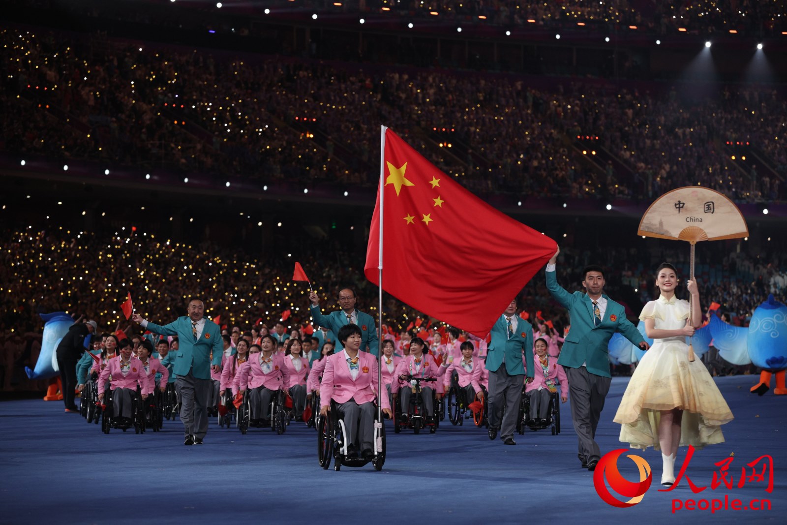 開幕式上，中國體育代表團入場。人民網(wǎng) 周靜圓攝