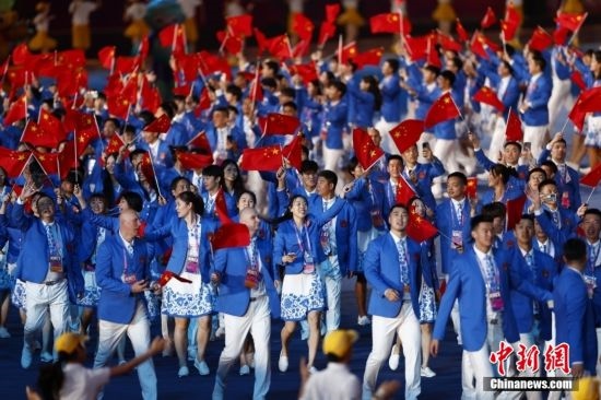 資料圖：9月23日，杭州第19屆亞運會開幕式舉行。中國代表團身著星辰藍(lán)禮服驚艷亮相。<a target='_blank' href='/'><p align=