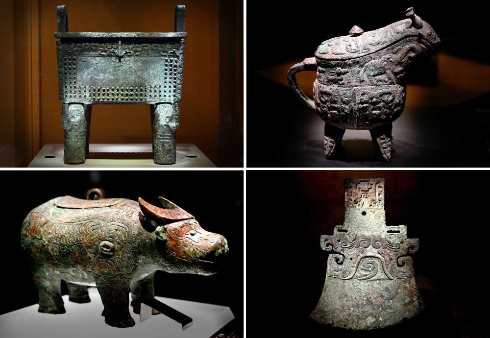 這是殷墟博物館新館內(nèi)展出的“司母辛”銅鼎（左上）、“亞長(zhǎng)”銅觥（右上）、“亞長(zhǎng)”牛尊（左下）、“亞長(zhǎng)”銅鉞（拼版照片，2月23日攝）。