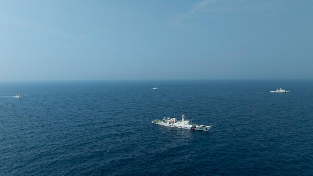 4月22日，中越海警艦艇編隊(duì)在北部灣海域開展聯(lián)合巡邏。（中國(guó)海警供圖）